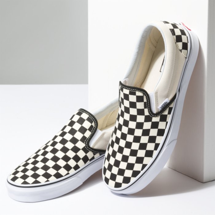 Black and white hotsell vans slip ons womens